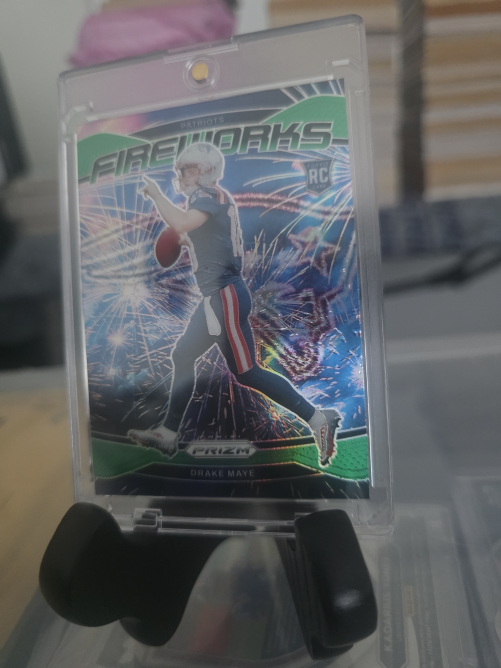 Drake Maye Panini Fireworks Rookie Card with Blue Holographic and Green Accents
